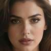Luciana Valente الصورة الرمزية للذكاء الاصطناعي